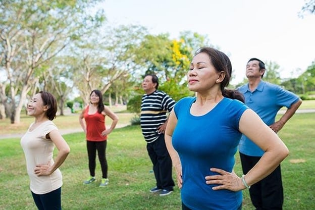 breathing-deeply-group-doing-buteyko-breathing-650
