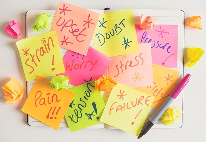 a personal or business diary covered in signs about stress and pressure