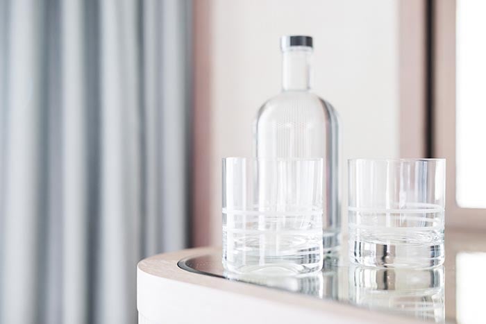 bottle-and-glasses-filled-with-water-700