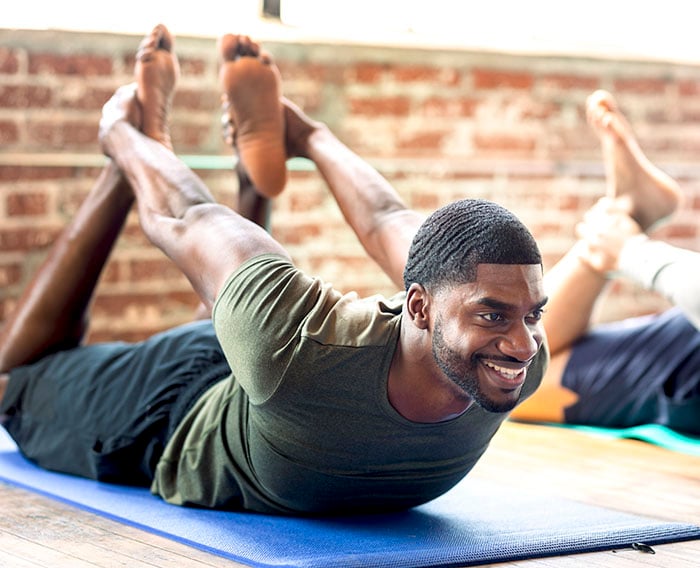 men in a yoga class