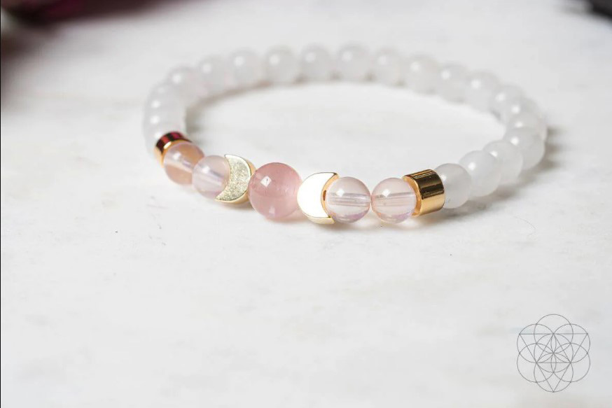 Celestial Crystal Charms  Moonstone Aquamarine and Rose Quartz Fertility  Wish Bracelet  8mm and 10mm Moonstone  is reffered to as womans healing  stone traditionally used for feminine healing and balancing