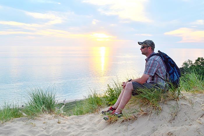 peace of mind man enjoying mindfulness at the beach