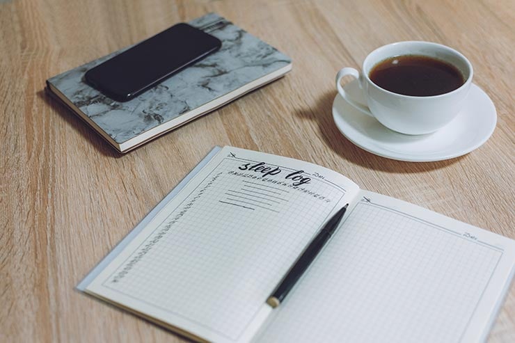 ways to improve your sleep by using sleep journal and reducing caffeine consumption