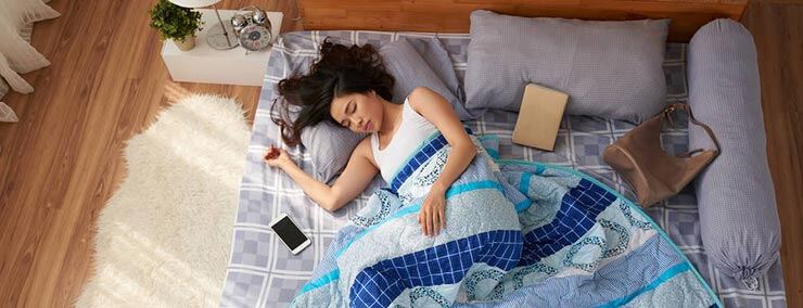 woman-sleeping-on-the-floor